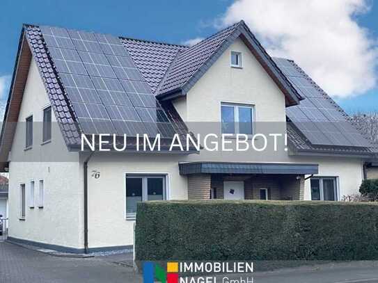 Familienidyll mit Photovoltaik: Charmantes Einfamilienhaus mit Wintergarten und Terrassen in Oetingh