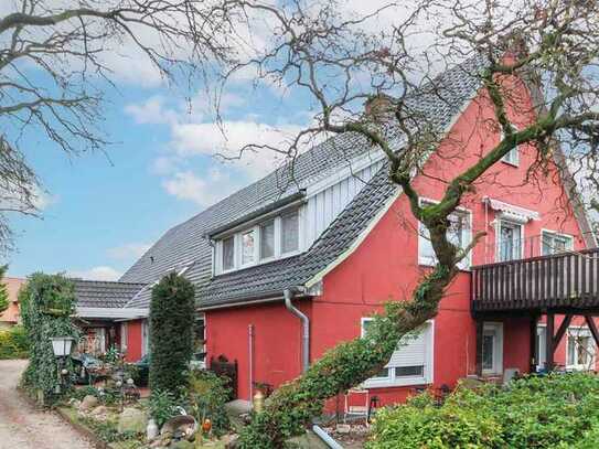 Familienparadies in Versmold: Charmantes Dreifamilienhaus in idyllischer Ortsrandlage