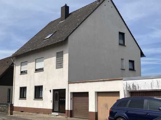 Gepflegte Eigentumswohnung mit Balkon, Garten und Garage