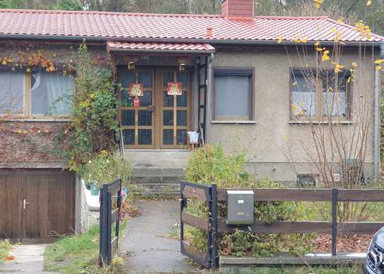 Bungalow mit Tiefgarage und Garten in ruhiger Anliegerstrasse