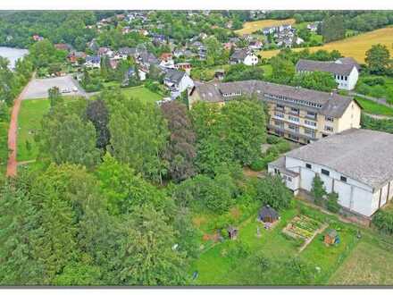 Vielseitig nutzbare Immobilie für Gewerbe, Wohnen/Pflege, direkt an der Fulda
