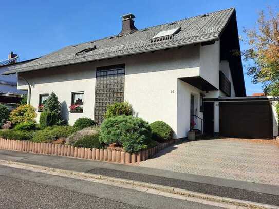 Traumhaftes Einfamilienhaus mit großem Garten, Terrasse & Garage