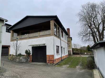 Einfamilienhaus mit Balkon, Einliegerwohnung, großer Garage und Kamin