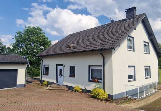 Stilvolles Einfamilienhaus mit Doppelgarage und großem Grundstück in hervorragender Lage!