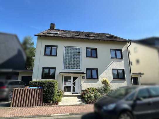 Platzwunder in Top-Lage: Mehrfamilienhaus mit Garten in Bad Vilbel-Dortelweil