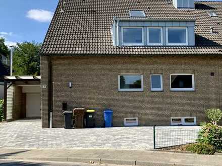 Erdgeschosswohnung im 2 Familienhaus mit großem Garten und Garage