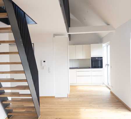 Neubau Erstbezug - schöne Wohnung mit Einbauküche, Galerie und Dachterrasse inkl. TG-Stellplatz