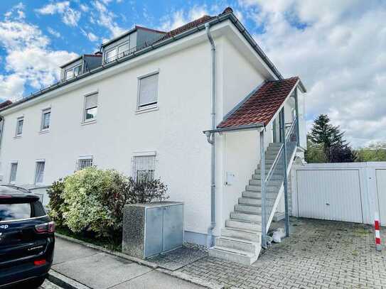 Erdgeschosswohnung mit überdachter Terrasse und eigenem Garten