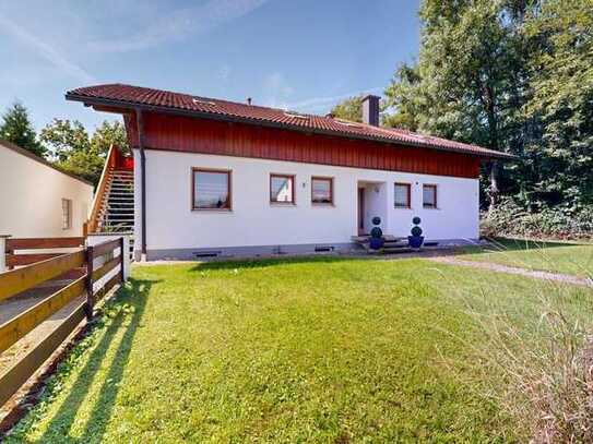 Attraktives 8 Zimmer Mehrfamilienhaus mit großem Garten in idyllischer Lage von Niederndorf