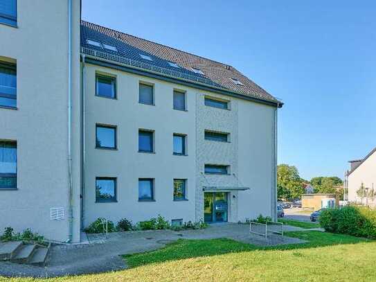 Moderne Dachgeschosswohnung mit Balkon