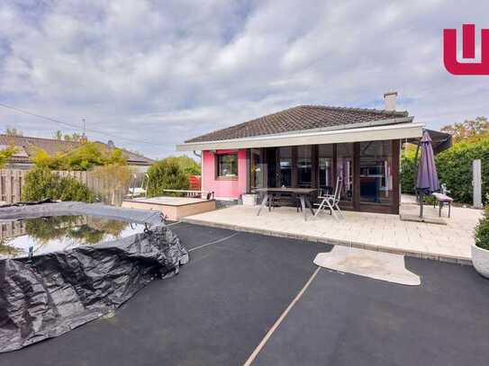 Für den Käufer provisionsfrei! Vermieteter Bungalow in Ortsrandlage - mit div. Anbauten