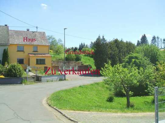 Gemütliches 1-2 Familienhaus mit gr. Terrasse und Stellplätzen auf großem, sonnigen Baugrundstück