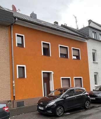 NIESEN IMMOBILIEN - Vermietetes Mehrfamilienhaus in Köln Rath/Heumar