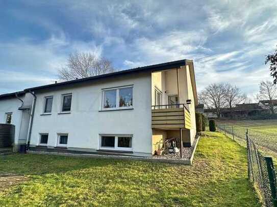 Mehrfamilienhaus mit Garten und Garage + Baugrundstück optional