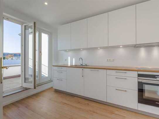 2 Zimmerwohnung mit hochwertiger Einbauküche und Dachterrasse in Zentrumsnähe