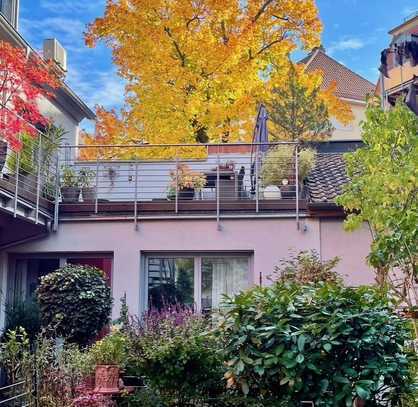 Aussergewöhnliche Maisonettewohnung in neuwertigem Zustand mit großer Südterrasse!