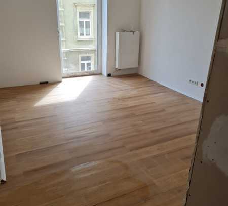 Schicke 2-Zimmer Wohnung mit großer Wohnküche im Erstbezug Zustand