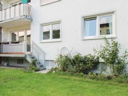 Hochparterre-Wohnung mit moderner EBK und Südbalkon, direkter Gartenzugang!