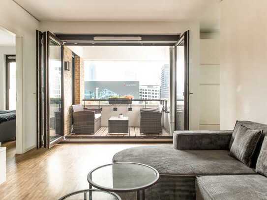 Modernes Luxusapartment mit Loggia, Designer-Küche, Tiefgaragenstellplatz und Skyline-Blick