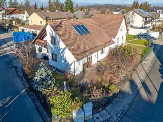 Sonniges Eckgrundstück mit Einfamilienhaus und Garage