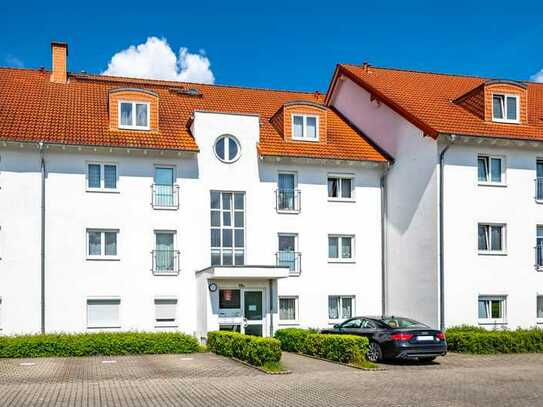 Langenselbold: Vermietete, gepflegte 3-Zimmer-Wohnung mit Balkon und zwei Stellplätzen