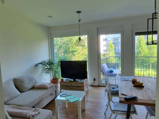 Moderne Wohnung mit 2 Balkonen + Tiefgarage & Garten