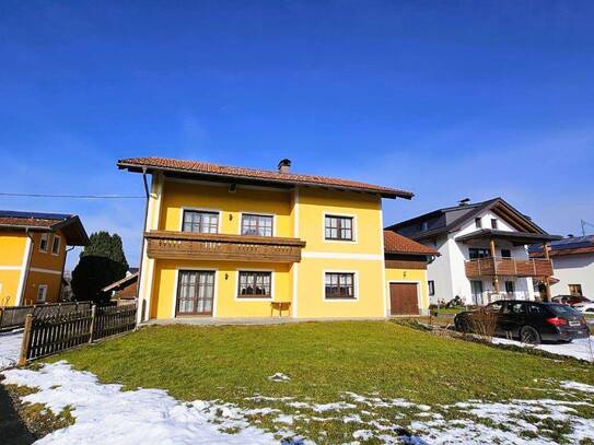 Wohnung im Zweifamilienhaus mit großem Garten und Garage