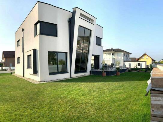 Design-Einfamilienhaus mit gehobener Ausstattung in 2441 Mitterndorf: 198 m², 4 Zimmer, neuwertig, Garten, Garage u.v.m.