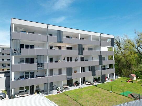 Begehrte & elegante Neubauwohnung in Grünlage mit riesigem 18,5qm Balkon, Fußbodenheizung & Badewanne und sonniger Südo…