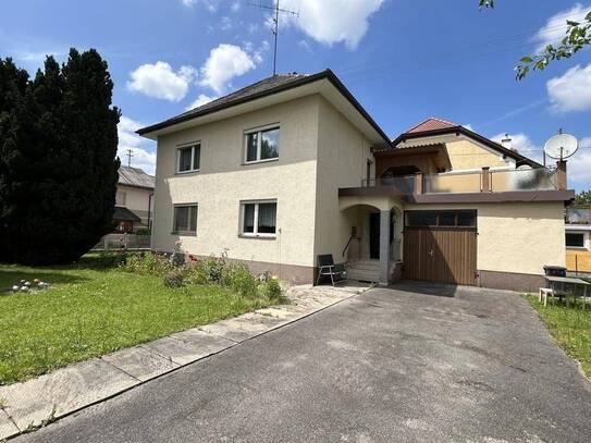 Einfamilienhaus in ruhiger Wohnsiedlung - mit Garten und Garage.