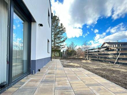 Wohnen am Waldrand - Traumhaftes Eigenheim mit privater Gartenoase und knapp 30m² Dachterrasse.