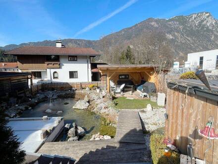 Idyllische Doppelhaushälfte mit eigenen Schwimmteich und großen Garten in Breitenbach am Inn zu verkaufen!