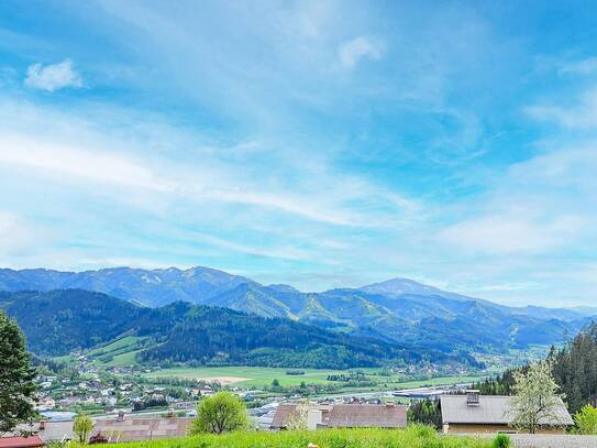 Baugrundstück mit Bergpanorama und Top Anbindung