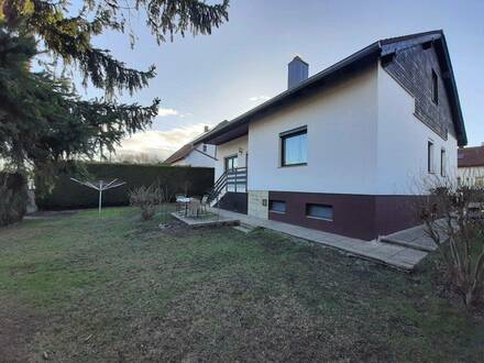 Einfamilienhaus mit Potential auf einem sonnigem Grundstück in ruhiger Lage neben dem Au-Wald