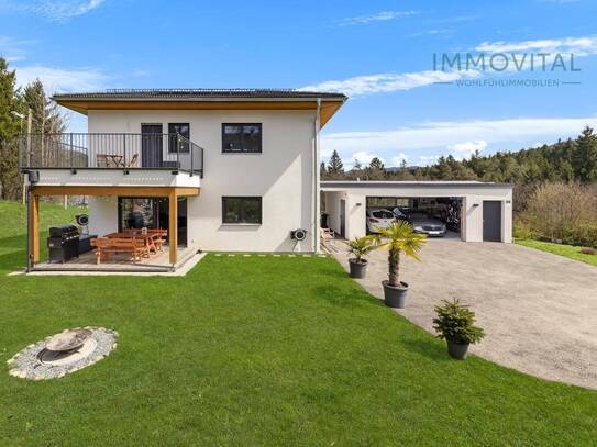 Idyllisch Wohnen in Schiefling: Modernes Einfamilienhaus mit Doppelgarage in Grünruhelage