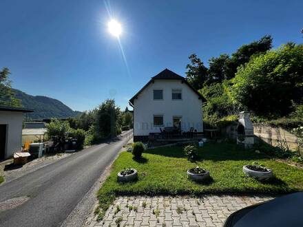 Charmantes Doppelhaus mit riesigem Grundstück - Naturwohnen nahe Klagenfurt und Klopeiner See!