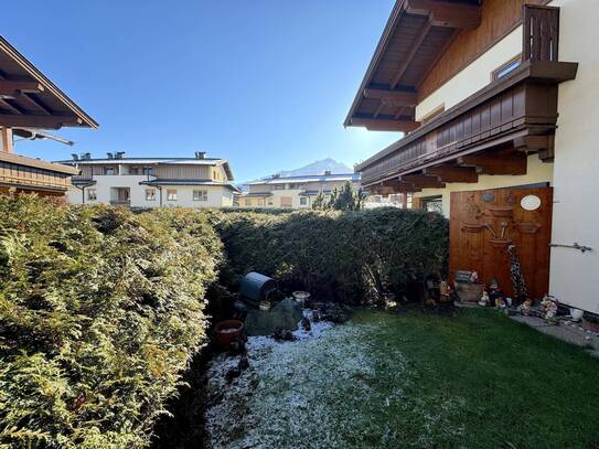 Erdgeschosswohnung mit privatem Garten und Tiefgaragenplatz in zentraler Lage von St. Johann