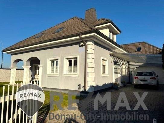 "Gepflegtes Einfamilienhaus mit Pool und Garage!"