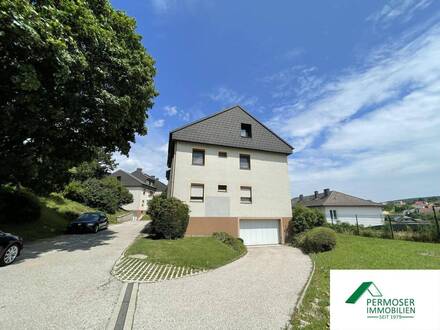 Eigentumswohnung mit Balkon, 2 Kinderzimmern und Garagenstellplatz, zu verkaufen