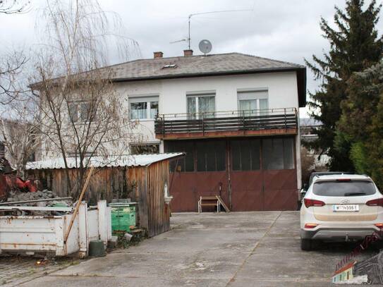 Gut gelegenes Haus mit großer Garage im 21. Bezirk ideal für Firmen auf Pachtgrund
