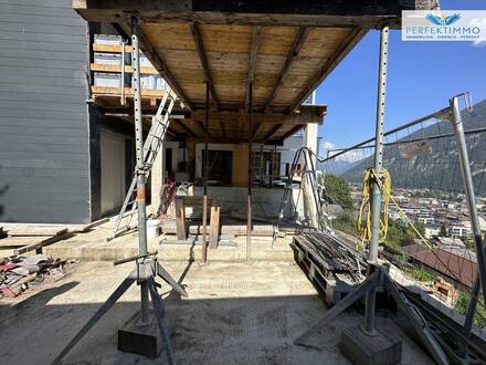 Rohbau-Objekt mit zwei Bauteilen in Aussichtslage