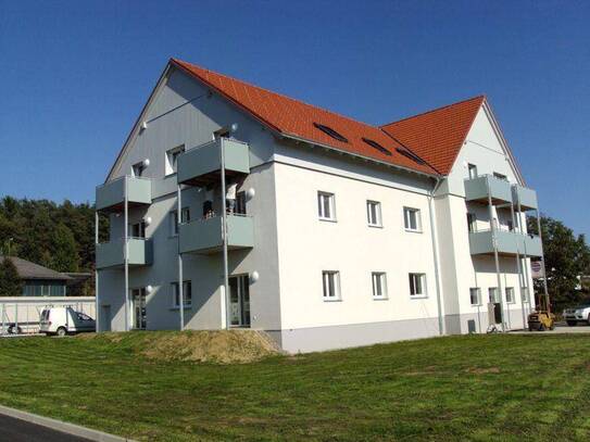 Familiengerechte Neubauwohnung mit Terrasse, Einbauküche und Carport Abstellplatz