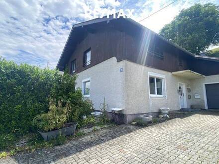3-Zimmer-Eigentumswohnung mit eigenem Garten, Garage und 2 weiteren Abstellplätzen