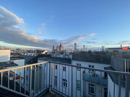 Einzigartige Gewerbeimmobilie mit atemberaubender Dachterrasse in einem historischen Ambiente.