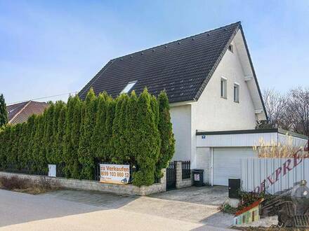 Einfamilienhaus in ruhiger Siedlungslage = Wintergarten = Garage = sonniger Garten