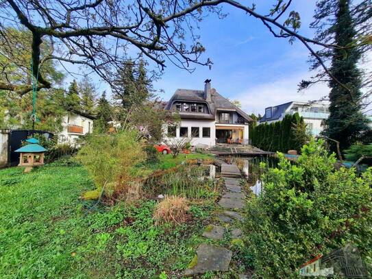 Natur- und WohnJUWEL in der Stadt – Ihr Traumhaus mit Schwimmteich