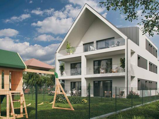 Modernes Wohnhaus (mit 4 Einheiten) nahe dem Wasserwald - Charmante Eigentumswohnung TOP 3 mit Balkon und Gartenanteil