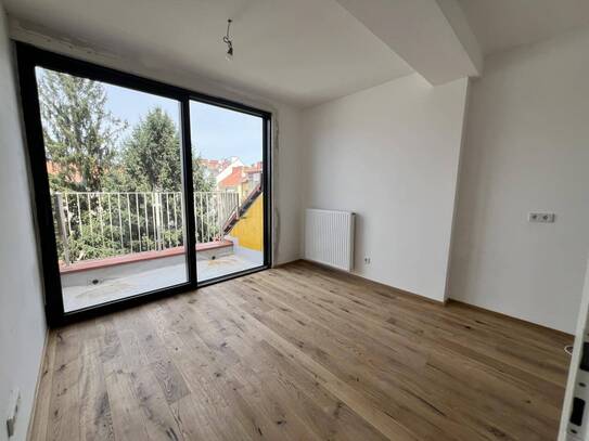 Erstbezug: Moderne Dachgeschosswohnung mit Balkon und Lift in begehrter Lage nahe dem Lendplatz K6/9