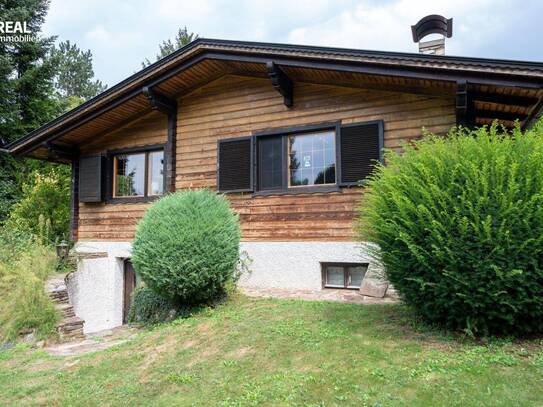 Wunderschöne Holzblockhütte in absoluter Ruhelage zu kaufen - 84m², Doppelgarage, Gartenhütte, bewohnbarer Keller mit s…