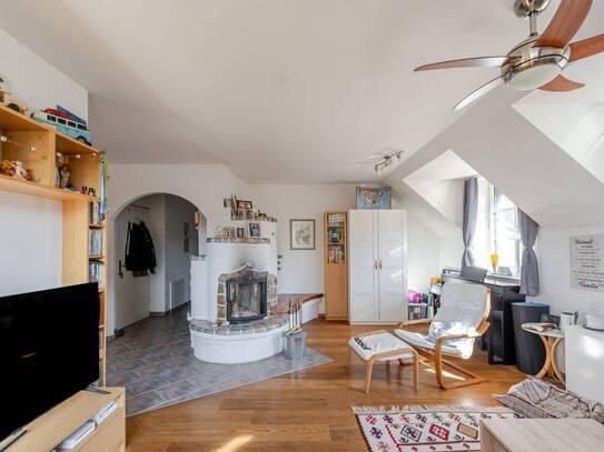 Charmante 106 m² Wohnung mit Balkon, Eigengarten & Kamin